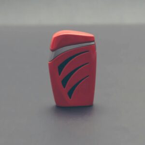 Close-up of a stylish modern red plastic lighter on a grey background, perfect for design and lifestyle themes.